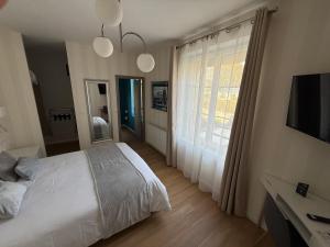 Postel nebo postele na pokoji v ubytování OXXOTEL & Spa