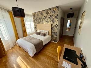 Postel nebo postele na pokoji v ubytování OXXOTEL & Spa