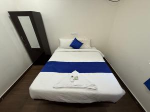 Een bed of bedden in een kamer bij COCO NET Hotel