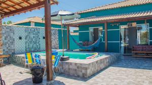 Swimmingpoolen hos eller tæt på Refúgio dos Lagos 10min da praia