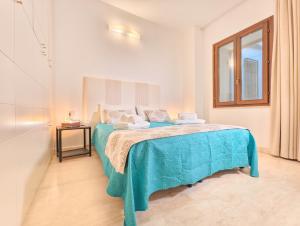 Postel nebo postele na pokoji v ubytování Oidu - Cagliari Suites