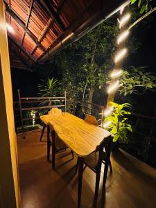 Balkón nebo terasa v ubytování Swasta Homestays Wayanad