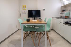 Kuchyň nebo kuchyňský kout v ubytování 016T Y's INN 中野 東中野駅徒歩9分 新宿まで直通4分 1ldk戸建 コンビニそば 衛生的キッチン カップル向き + 10 fotografií
