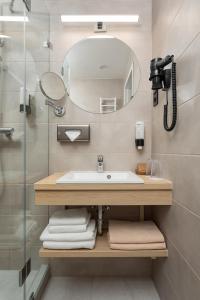 Koupelna v ubytování Hunguest Hotel Flóra