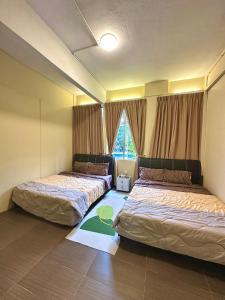 Billede fra billedgalleriet på Nest Inn Kampar 2R2B for 16pax i Kampar