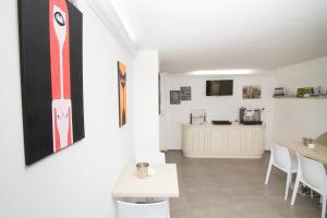 Kuchyň nebo kuchyňský kout v ubytování Al Bastione Relais Suite & Rooms