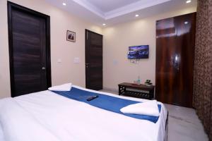 Postel nebo postele na pokoji v ubytování Hotel SOHO 62
