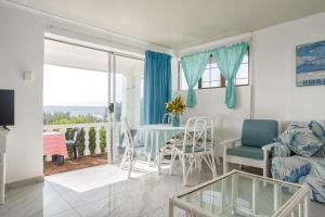 Posezení v ubytování Barieta Beach Cottages - Self Catering