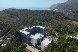 an overhead view of a building with a swimming pool at Poolside Duplex In Nai harn UTL A102 in Rawai Beach