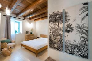 Ένα ή περισσότερα κρεβάτια σε δωμάτιο στο Casa Ninetta