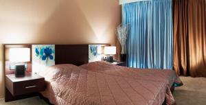 Postel nebo postele na pokoji v ubytování Hotel Cezaria