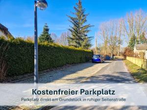 a car parked on a street with a street light at Peenemünde, Fewo OG in Peenemünde