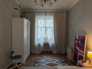 Posteľ alebo postele v izbe v ubytovaní Art apartment on Rynok Square