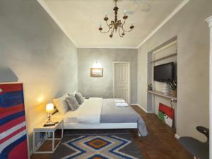 Posteľ alebo postele v izbe v ubytovaní Art apartment on Rynok Square