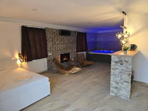 Кровать или кровати в номере NEZNAŠOVY Restaurant - Penzion - Wellness - Sauna - SPA