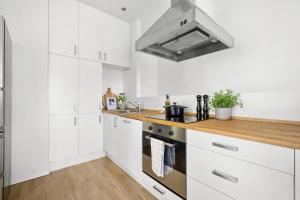 Dapur atau dapur kecil di Leilighet Torshov, balkong, 2 soverom, sentralt