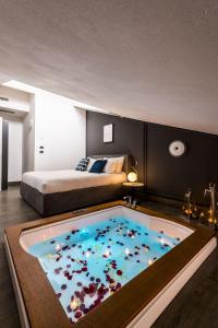 Postel nebo postele na pokoji v ubytování The Hotel Gift City + 14 fotografií