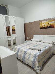 Postel nebo postele na pokoji v ubytování Casa Francy a 5min da Marzamemi