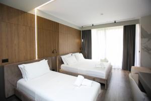 Letto o letti in una camera di Charm Hotel