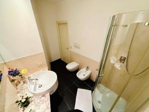 Koupelna v ubytování TURATI ROOMs