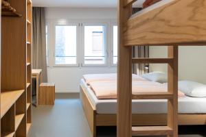 Voodi või voodid majutusasutuse Martigny Youth Hostel toas