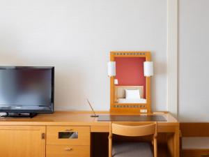 TV a/nebo společenská místnost v ubytování The Mark Grand Hotel