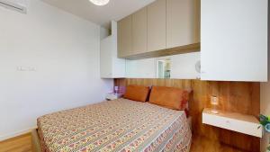 Ένα ή περισσότερα κρεβάτια σε δωμάτιο στο Perda bianca relais apartment