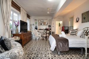 Et tv og/eller underholdning på Moonlit Tides Cottage + 18 billeder