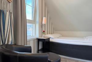 Katil atau katil-katil dalam bilik di Jibben Hotell