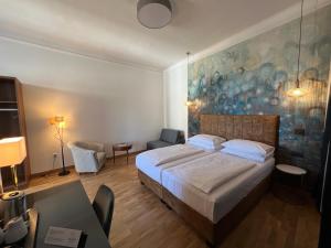 Letto o letti in una camera di Hotel Secession an der Oper