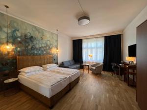 Letto o letti in una camera di Hotel Secession an der Oper