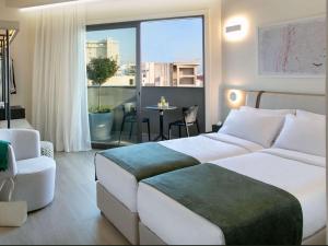 Postel nebo postele na pokoji v ubytování Mercure Larnaca City + 37 fotografií
