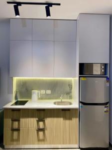 Kuchyň nebo kuchyňský kout v ubytování Aqva infinity resort c102