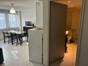 Μια τηλεόραση ή/και κέντρο ψυχαγωγίας στο Appartements RESIDILAVERDE Hypercentre