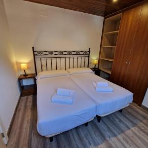 A bed or beds in a room at Eth Palai