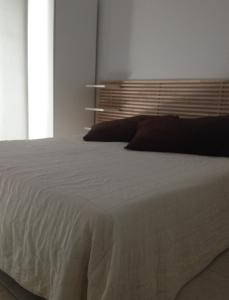 Postel nebo postele na pokoji v ubytování Hotel Marko