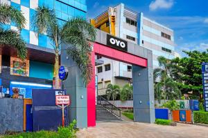 a building with aoxide sign in front of it at Super Hotel O Botcha Convection in Visakhapatnam
