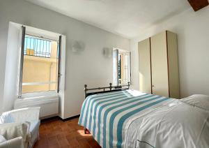 A bed or beds in a room at Camere Francesca