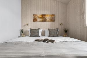 En eller flere senge i et værelse på Ferienhaus Bellevue - Sankt Andreasberg im Harz