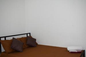 Ένα ή περισσότερα κρεβάτια σε δωμάτιο στο SSS HOTEL