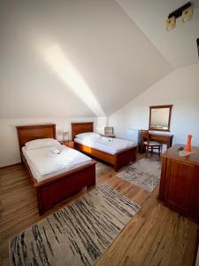 Postel nebo postele na pokoji v ubytování Penzion Urban