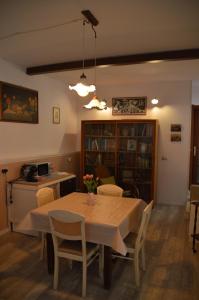 a dining room with a table and some chairs at Dalla Fede in Loreto
