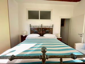 A bed or beds in a room at Camere Francesca
