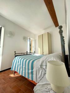 A bed or beds in a room at Camere Francesca