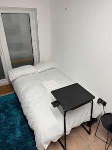 Ένα ή περισσότερα κρεβάτια σε δωμάτιο στο Studio in NW9