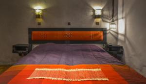 Voodi või voodid majutusasutuse Hotel Islane toas