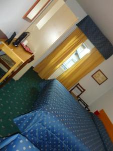 Postel nebo postele na pokoji v ubytování Albergo Centrale