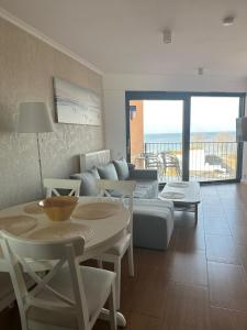 Posedenie v ubytovaní Apartament Sova