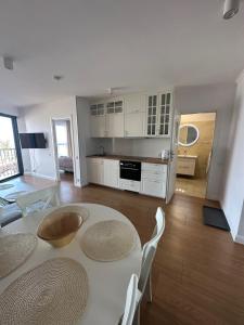 Kuchyňa alebo kuchynka v ubytovaní Apartament Sova