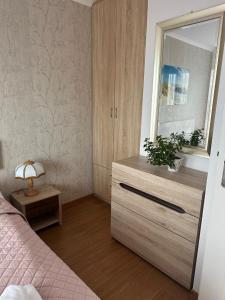 Posteľ alebo postele v izbe v ubytovaní Apartament Sova